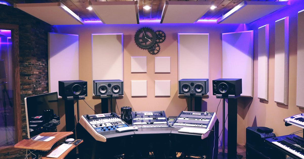 Modern recording studio with high-tech audio equipment and stylish lighting.